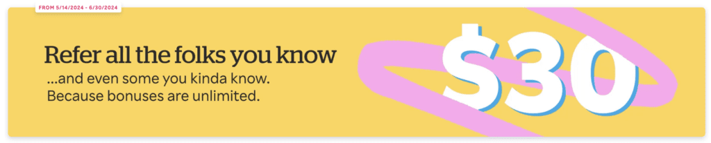 a yellow card with a pink ribbon and black text